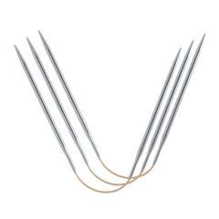 CrasyTrio Classic Short flexibla stickor i metall mot ljus bakgrund.