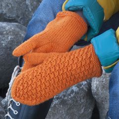 Neuleohje neulotut oranssit lapaset
